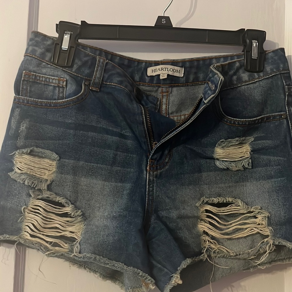 Heart loom distressed denim shorts.